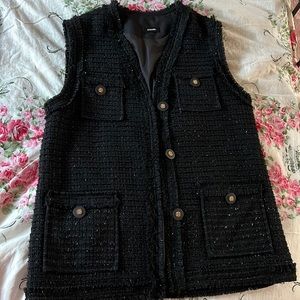 Tweed sleeveless vest